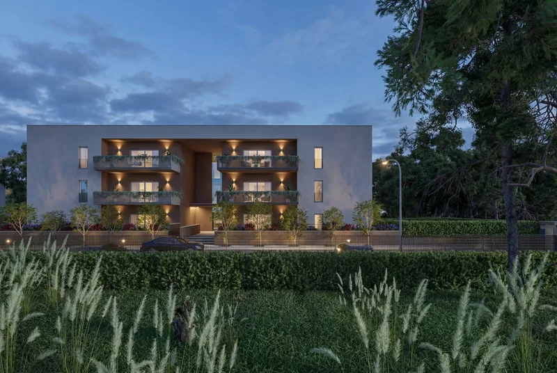 Render esterno al crepuscolo di una palazzina residenziale